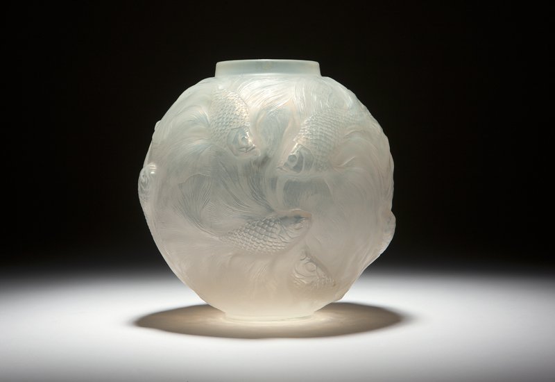 A Rene Lalique 'Formose' vase, No. 934: Designed 1924, engraved ''R. Lalique France'', of milky opalescent glass, the short neck over a circular body molded with a shoal of shibunkin fish, 6.75'' H x 6.5'' Dia., est:$1500/2000.