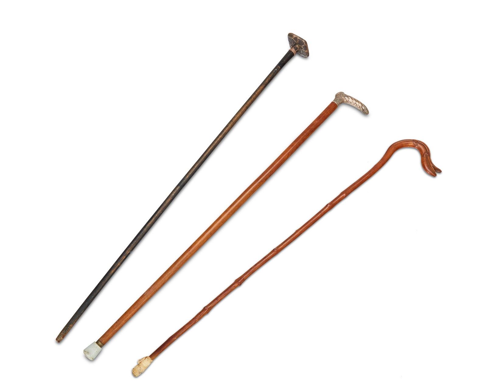 A group of antique carved wood walking canes (1 of 10)