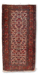 A Caucasian runner: A Caucasian runner20th centuryThe wool-on-wool rug with polychrome foliate motif6' 7" L x 3' 5" W