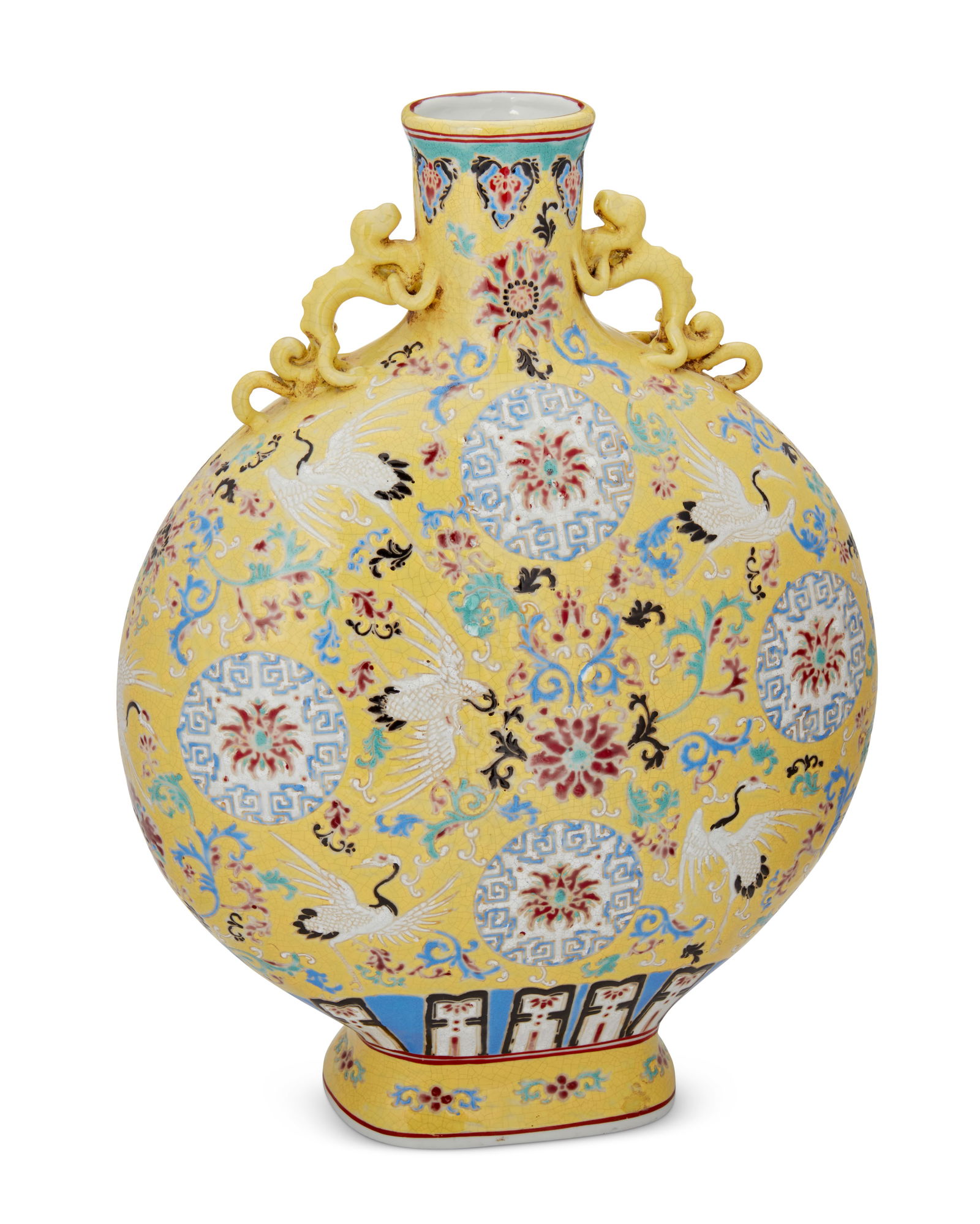 A Chinese enameled porcelain moon flask: A Chinese enameled porcelain moon flaskLate 20th centuryAppears unmarkedWith applied mythical beast form handles to the neck and all-over polychrome enameled lotus scroll motifs on a yellow enameled g