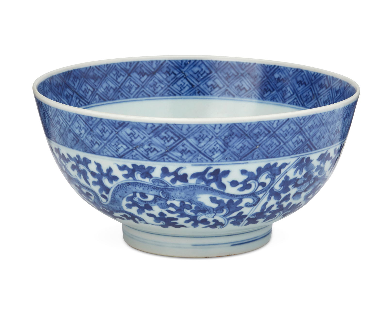 A Chinese blue and white porcelain bowl: A Chinese blue and white porcelain bowlLate Qing Dynasty (1644-1912) or laterMarked to the underside in blue underglaze with an apocryphal reign mark for Kangxi Period (1662-1722)The blue and white gl