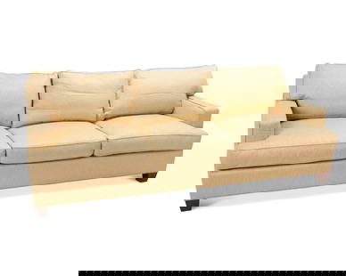 A Baker upholstered three-seater sofa: A Baker upholstered three-seater sofaLate 20th/early 21st centuryAppears unmarkedWith gold-colored silk and linen blend upholstery, set upon four squared wood legs34" H x 96" W x 39" D