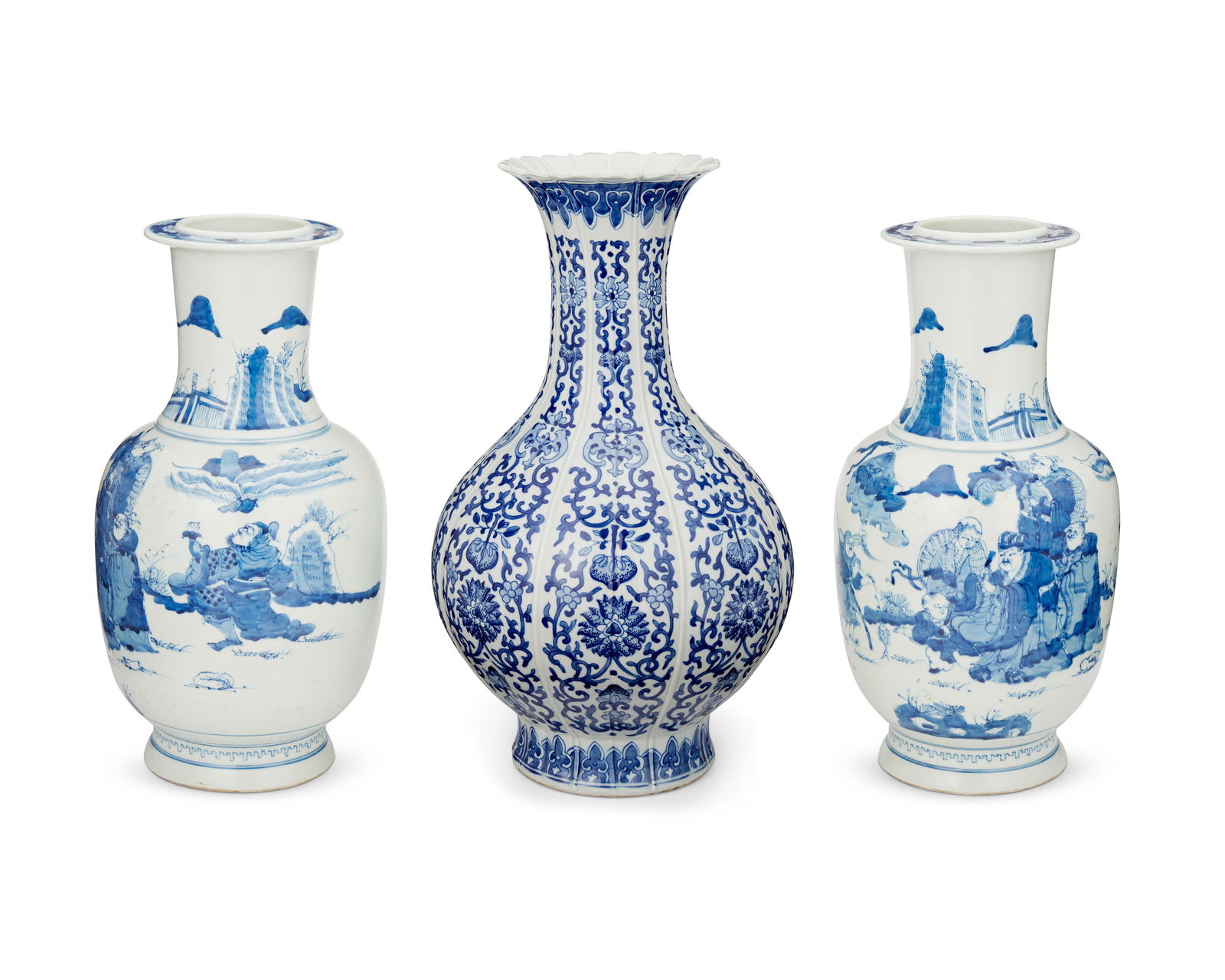 Three Chinese blue and white porcelain vases: Three Chinese blue and white porcelain vases20th centuryTwo marked to the underside with a double ring in blue underglaze; one marked to the underside in blue underglaze bearing an apocryphal reign ma