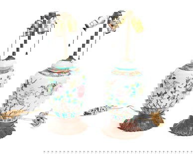 A pair of Chinese Famille Rose porcelain lamps: A pair of Chinese Famille Rose porcelain lamps20th centuryEach appears unmarkedEach ceramic ginger jar with enameled avian, butterfly, and floral tableaus in a Famille Rose palette, retrofitted as a t