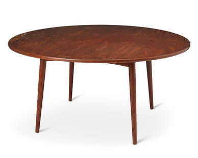 Hans Wegner (1914-2007), A dining room table for Andreas Tuck, mid-20th century, 28.625" H x 59": Hans Wegner (1914-2007)A dining room table for Andreas Tuck, mid-20th centuryBurn marked to underside: Fabrikat Andr Tuck / Arkitect Hans J Wegner / Denmark / Made in DenmarkThe circular table with te