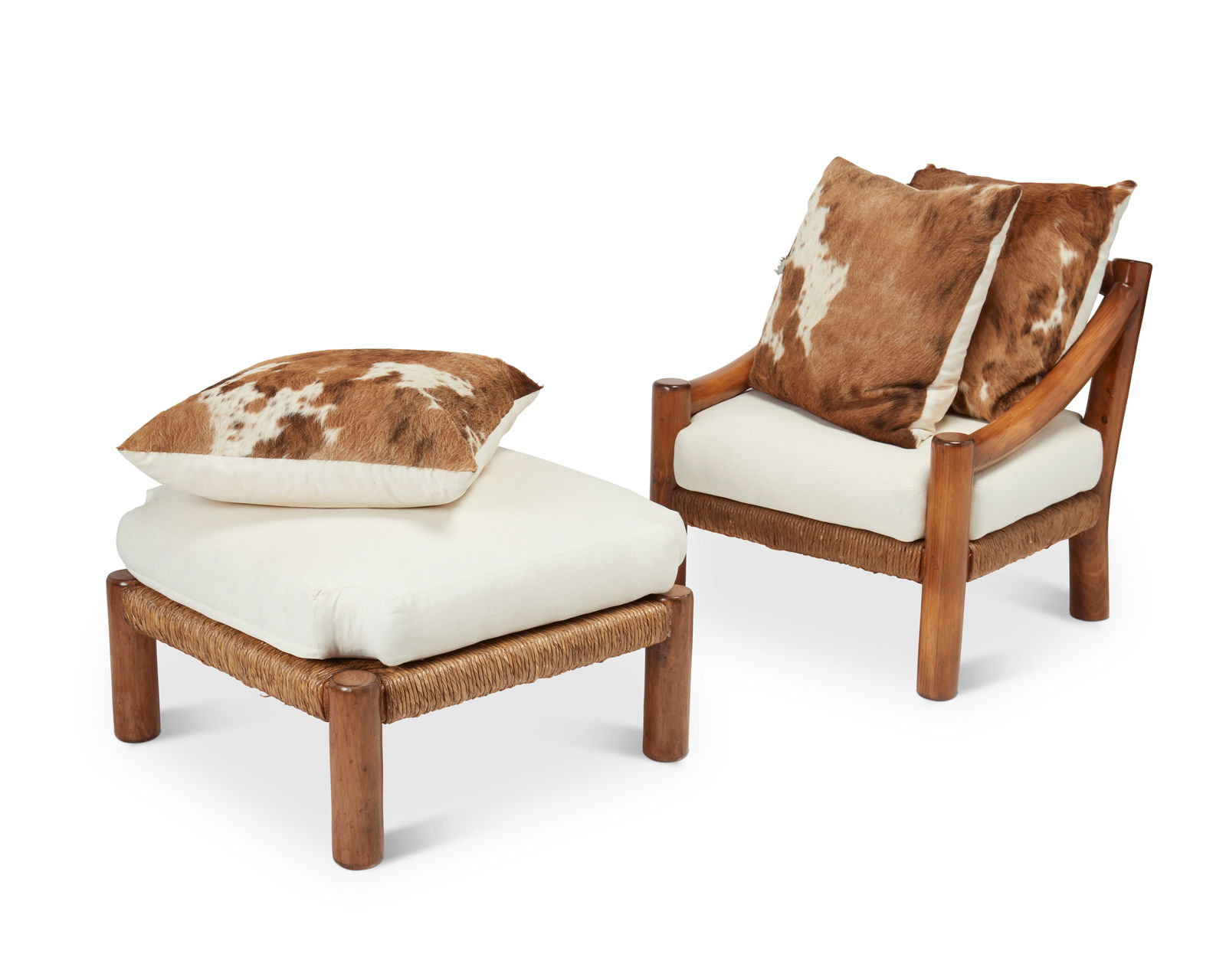 Michael Taylor (1927-1986), A "Montana" lounge chair and ottoman for Kreiss, early 21st century,: Michael Taylor (1927-1986)A "Montana" lounge chair and ottoman for Kreiss, early 21st centuryDesigned circa 1980sEach appear unmarkedEach with a chunky carved oak frame, woven rush seats, an