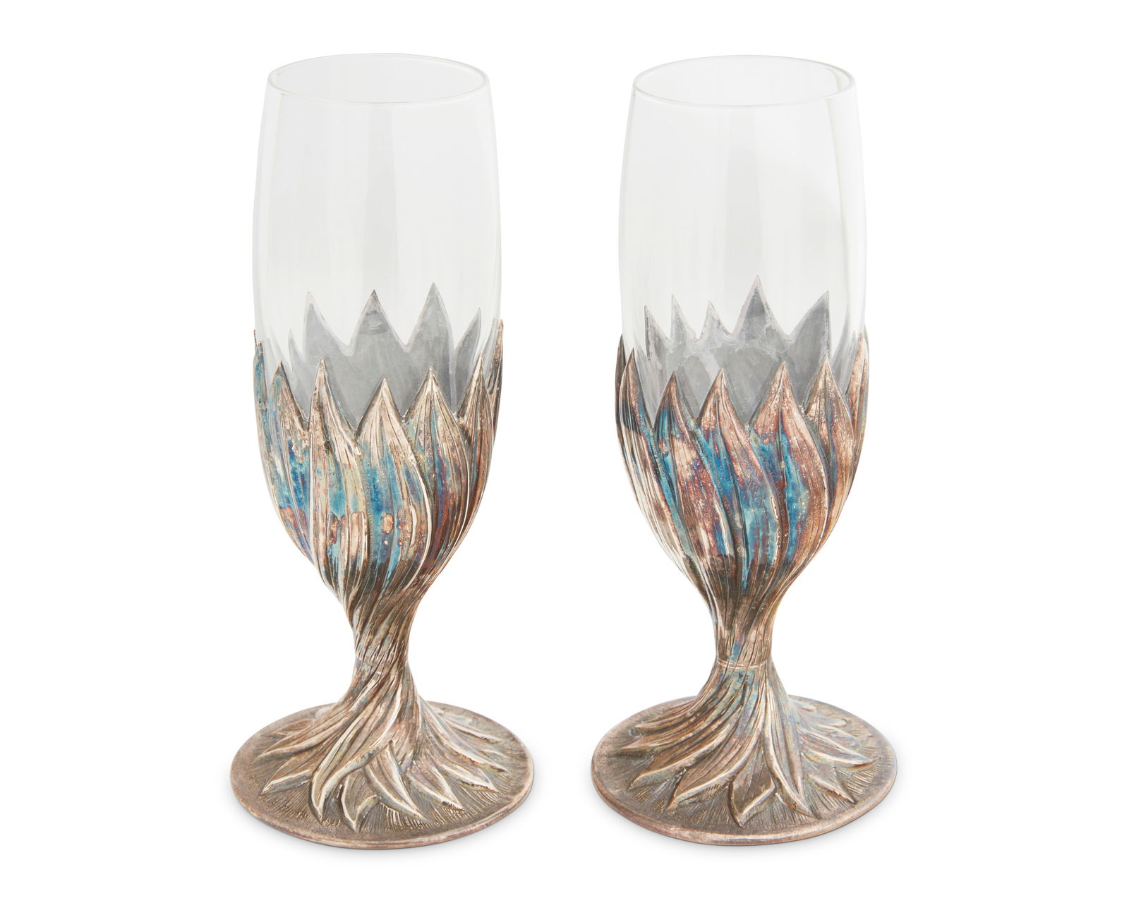 A pair of Buccellati "Flower" sterling silver champagne glasses: A pair of Buccellati "Flower" sterling silver champagne glassesLate 20th centuryEach stamped to the underside: Italy Z1693 / Buccellati / Gianmaria / 925 / [star] 245 MIEach with a cast ster