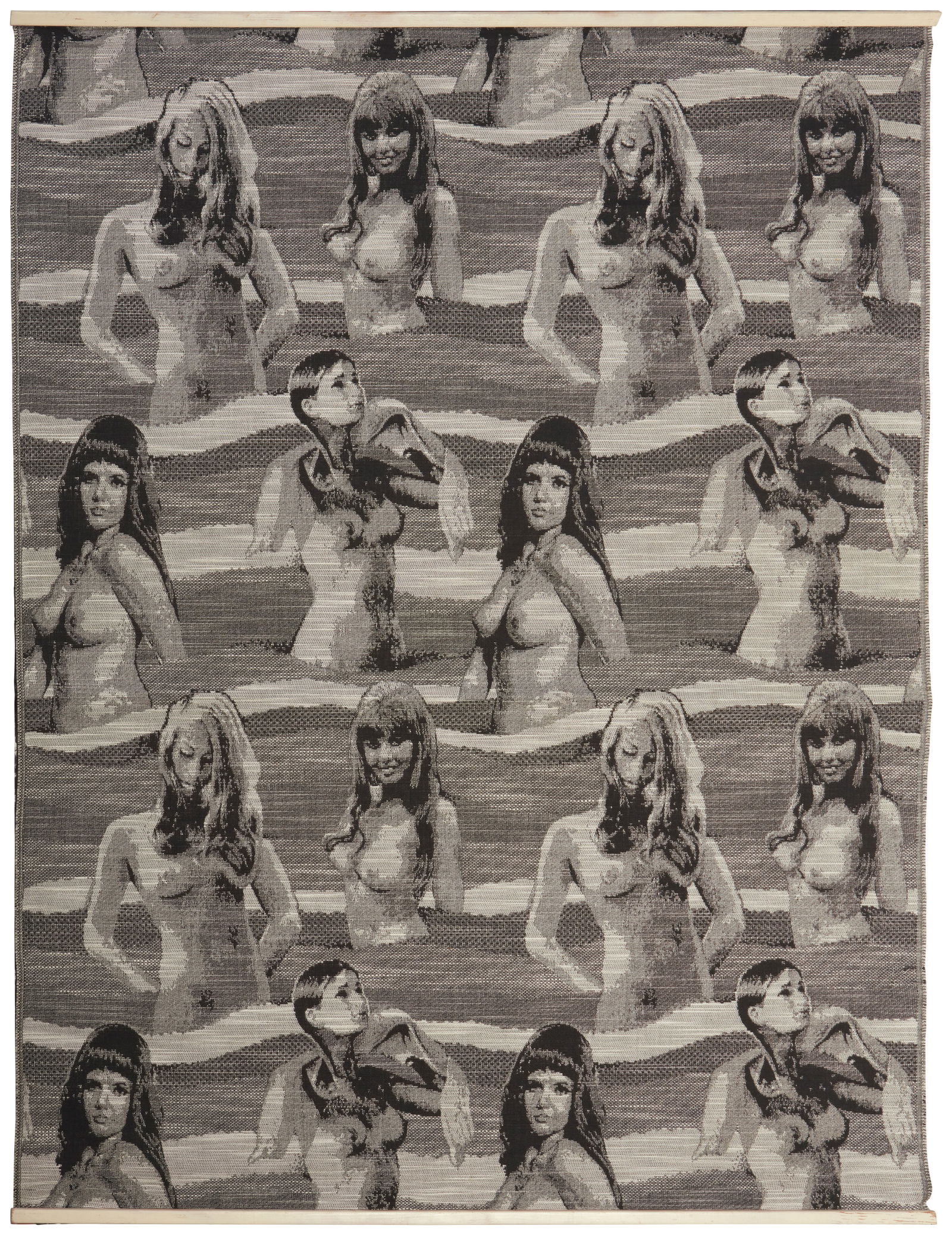 A black and white modern "tapestry" wall hanging: A black and white modern "tapestry" wall hangingMid/late 20th centuryComprising a length of machine-woven jacquard fabric featuring a design of multiple repeated images of various nude women
