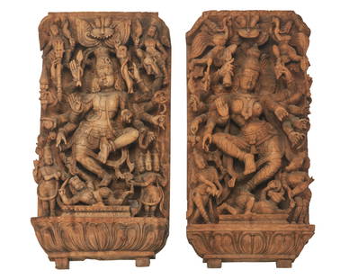 A pair of South Indian wood carvings of Shiva and Parvati: A pair of South Indian wood carvings of Shiva and Parvati19th century or laterEach appear unmarkedThe two panels, which likely served as decoration for "Rathas" or temple chariots used to ca