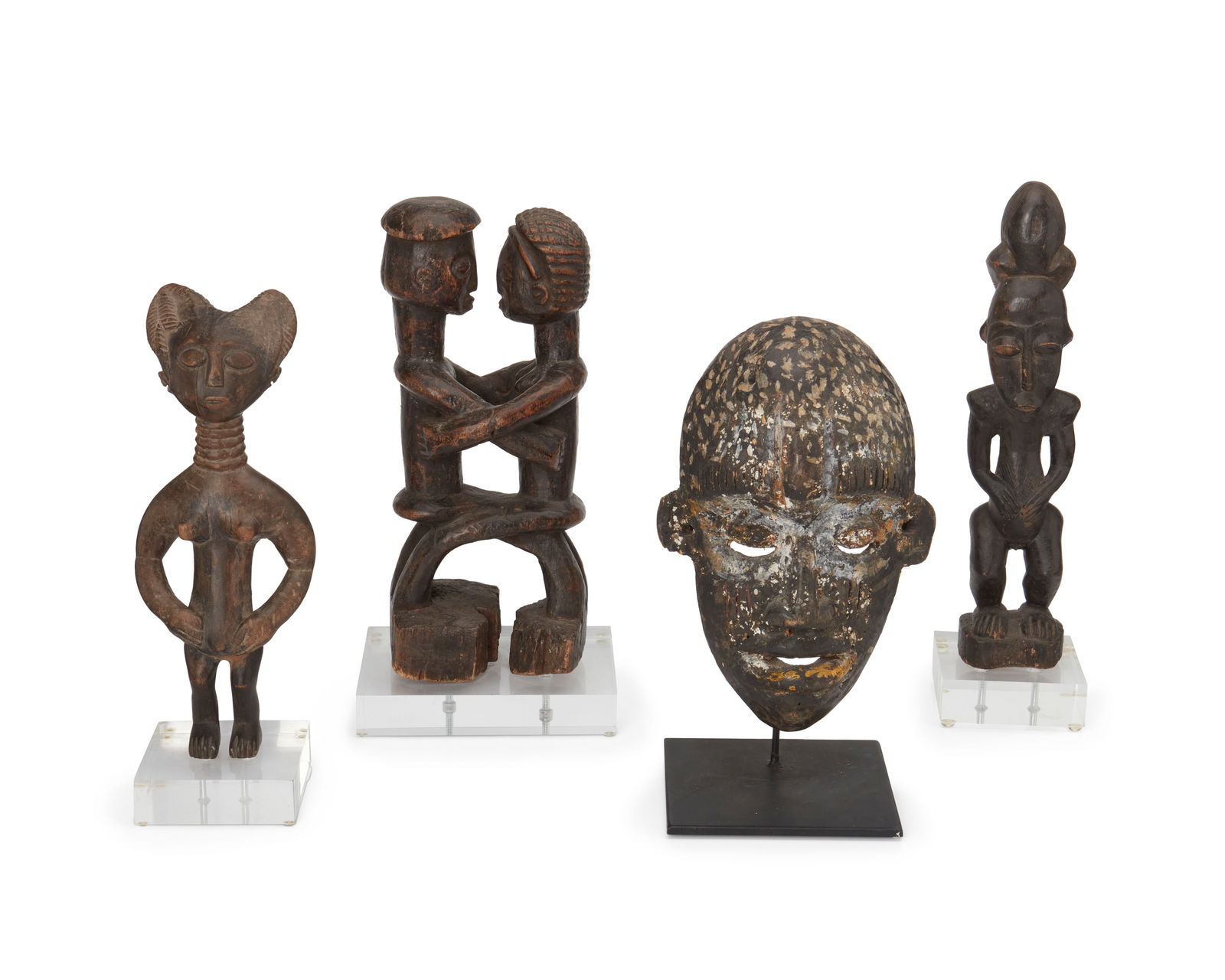 Three African carved wood figures and a mask (1 of 6)
