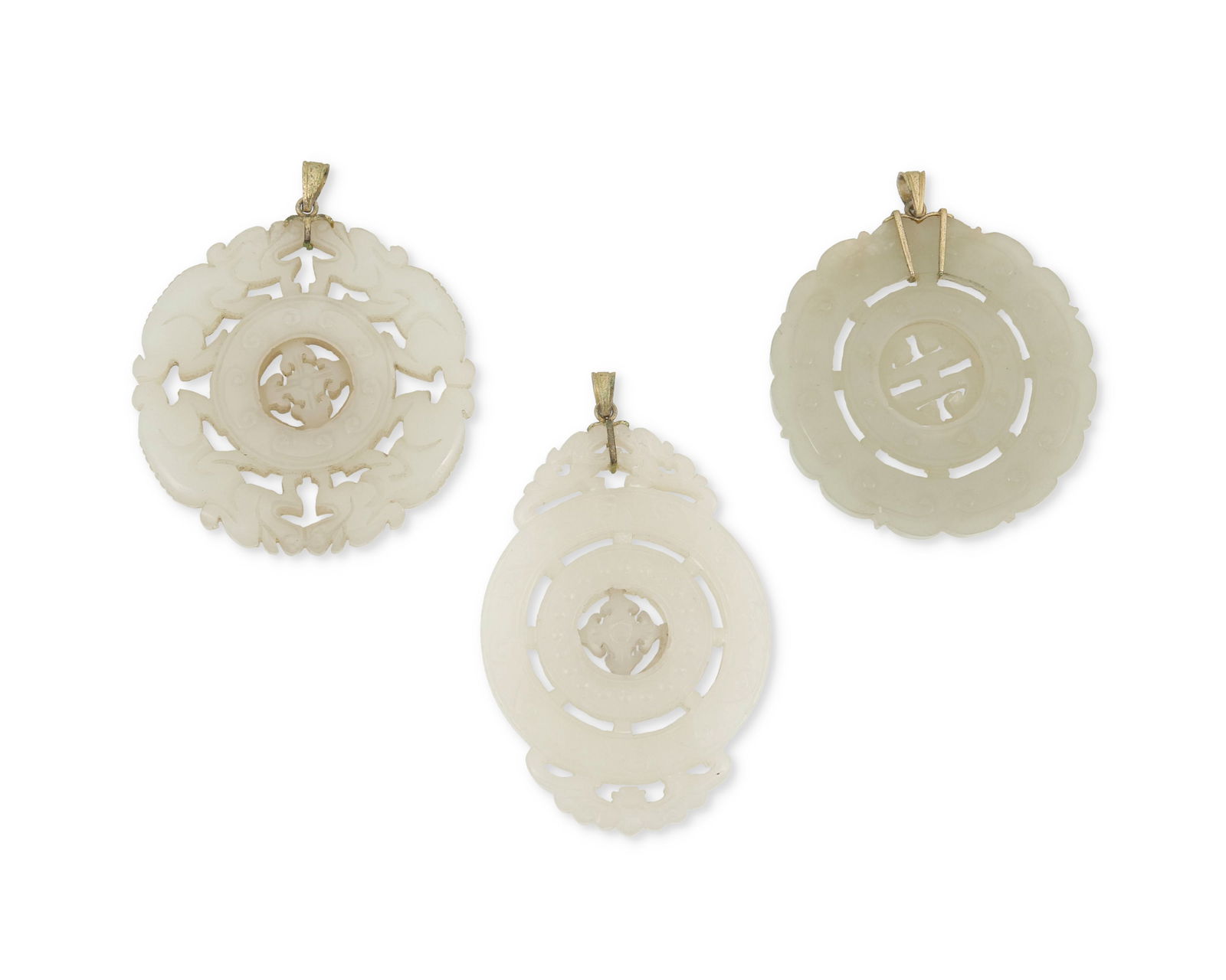 Three reticulated jade pendants (1 of 2)
