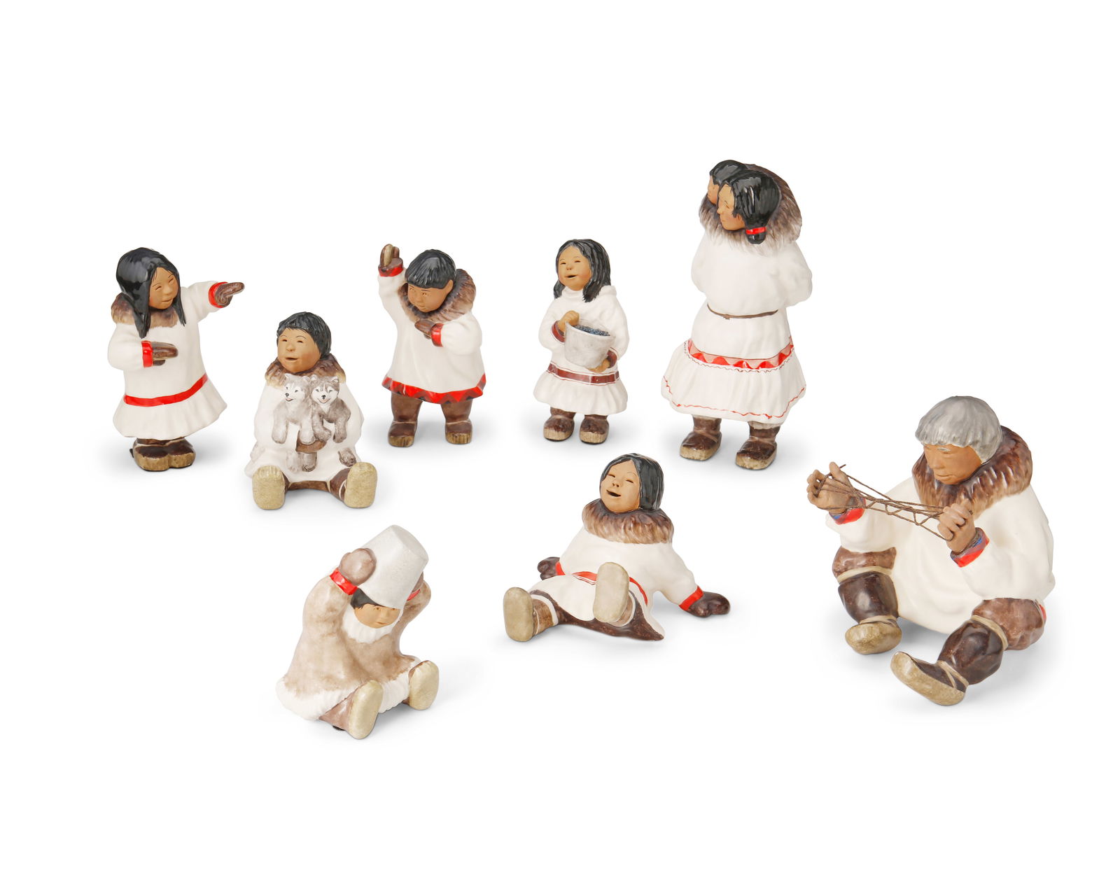 A group of C. Alan Johnson Inuit ceramic figurines (1 of 3)