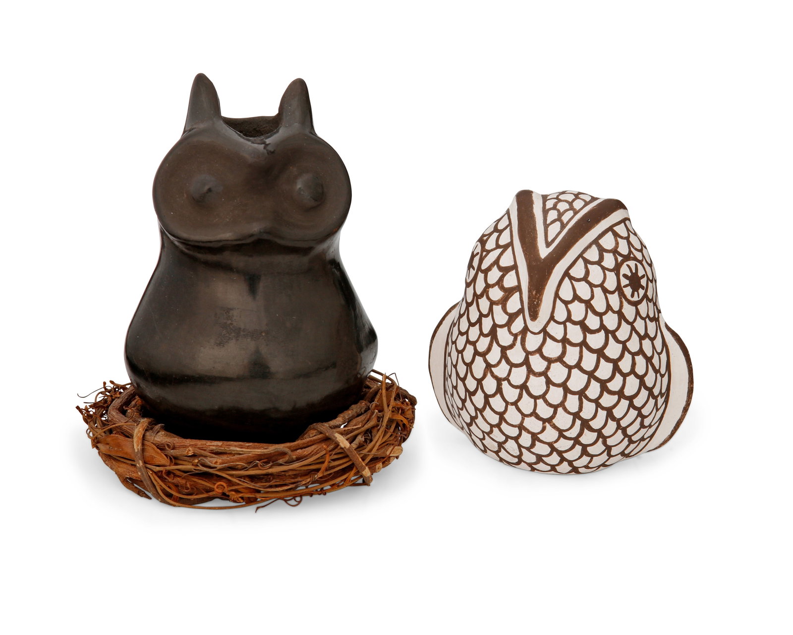 Two Puebloan pottery owls: Two Puebloan pottery owls Mid/late 20th century; Southwestern United States One marked to underside: [rising sun] / Acoma Sky City / Virginia Lowden; one marked: Santa Clara Comprising one Virginia Lo