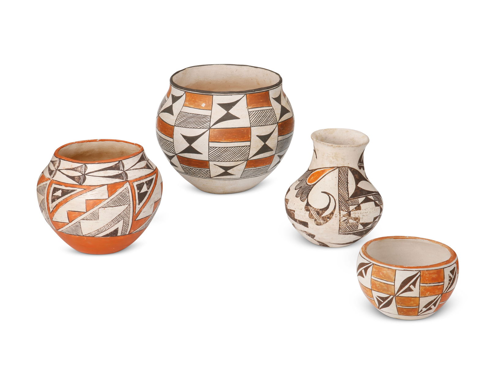 A group of Acoma Pueblo polychrome pottery vessels (1 of 2)