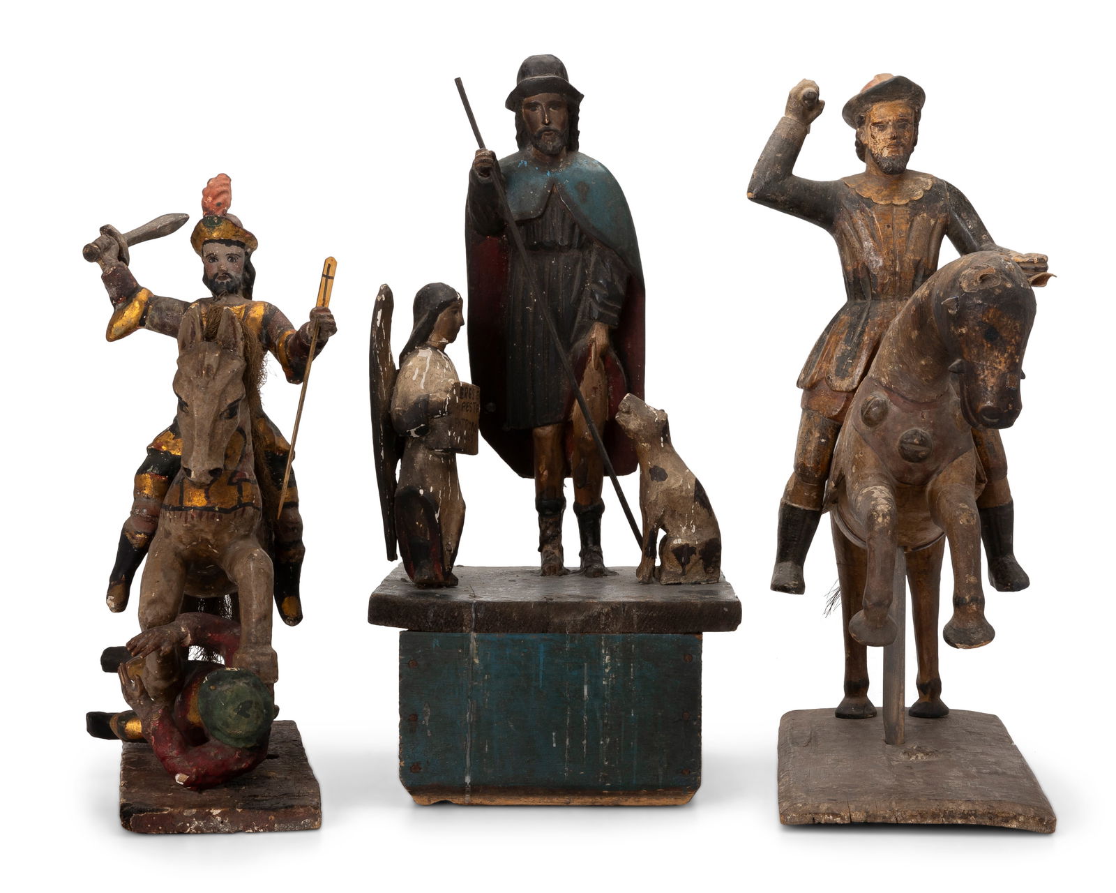 Three carved wood santos figures (1 of 10)