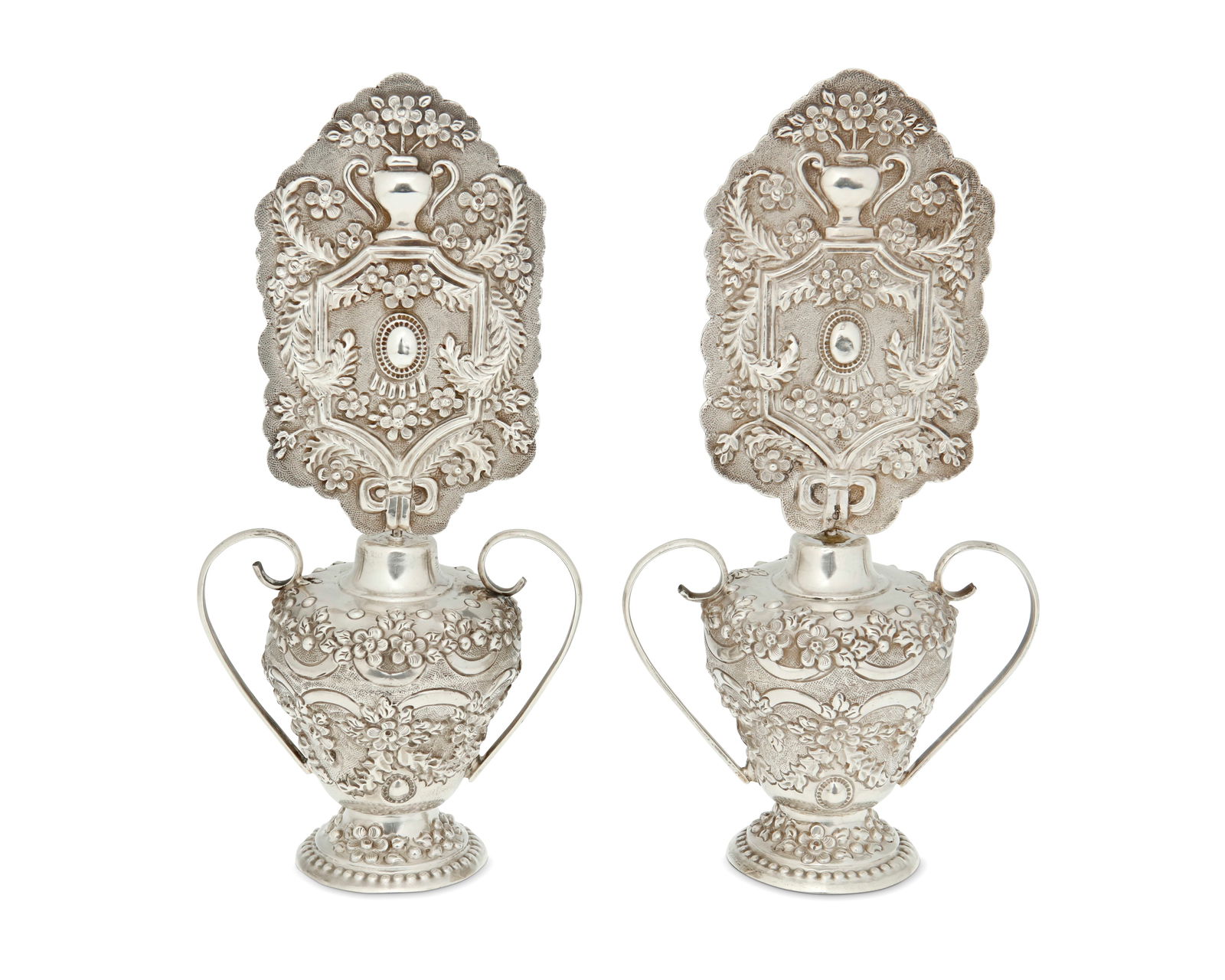A pair of silver candle screens (1 of 3)