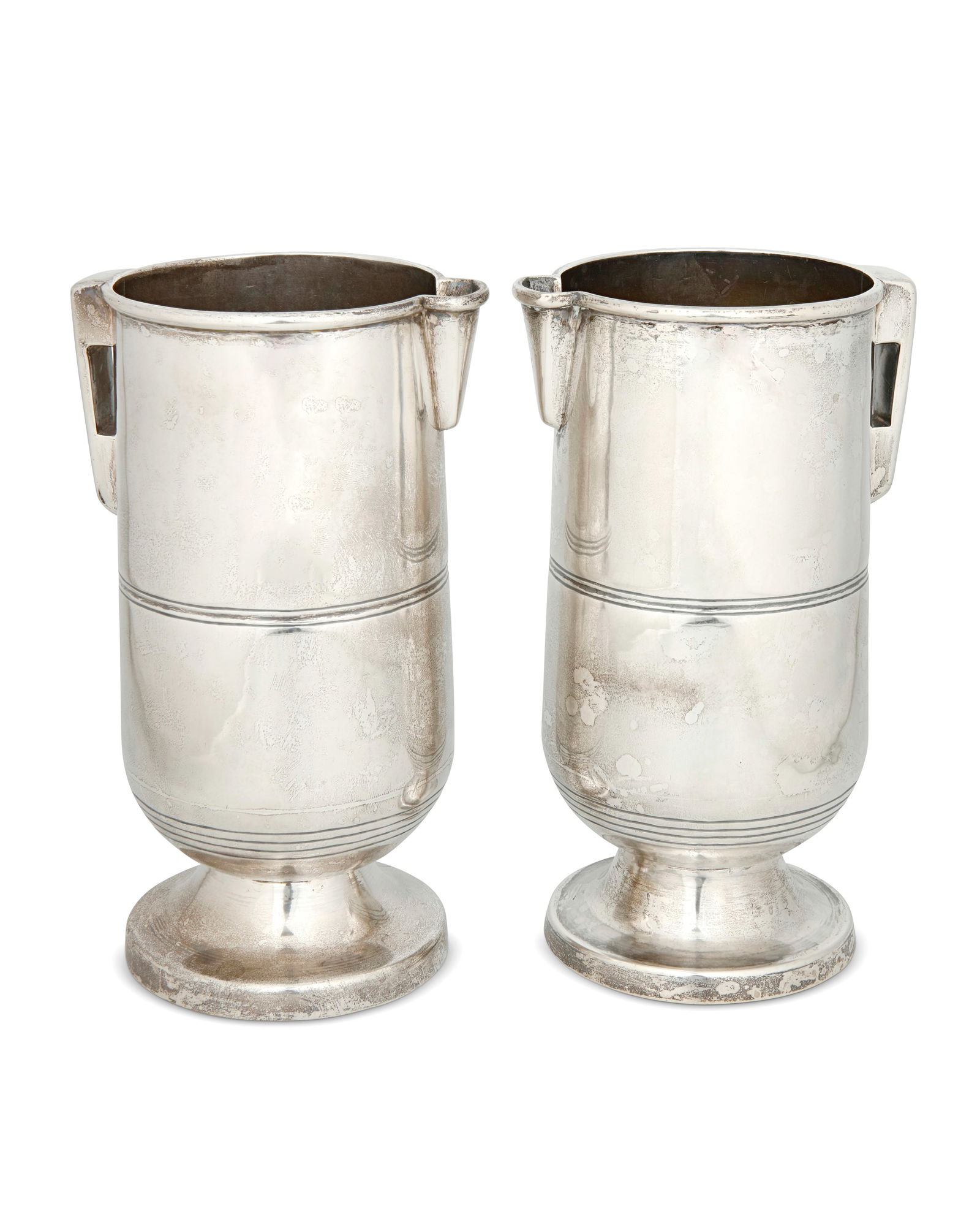 A pair of sterling silver water pitchers (1 of 3)