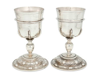 Two Mexican Spanish Colonial-style sterling silver goblets: Two Mexican Spanish Colonial-style sterling silver gobletsCirca 1930sEach marked: Sterling / Mexico / 925The goblets mounted to base with incised and repousse geometric motifs, 2 piecesEach: 7.125&quo