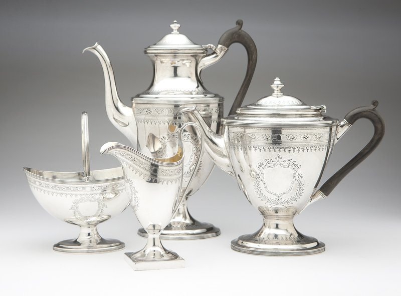 An English sterling silver coffee tea service: 18th and 19th centuries, London, an assembled service comprising: a coffee pot with wooden handle, 1794, maker's mark of Robert Hennell I (11.5'' H x 9.5'' W); a teapot with wooden handle, 1887, maker