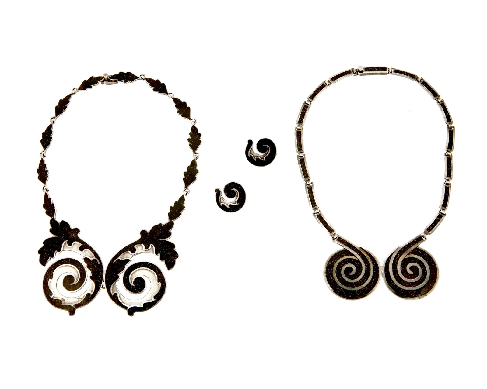 A group of Margot de Taxco silver and enamel jewelry: A group of Margot de Taxco silver and enamel jewelry Margot Van Voorhies (1896-1985) Circa 1955-1978; Taxco, Mexico Each stamped: Margot de Taxco / Sterling / Made in Mexico / [Eagle 16] / [Design num