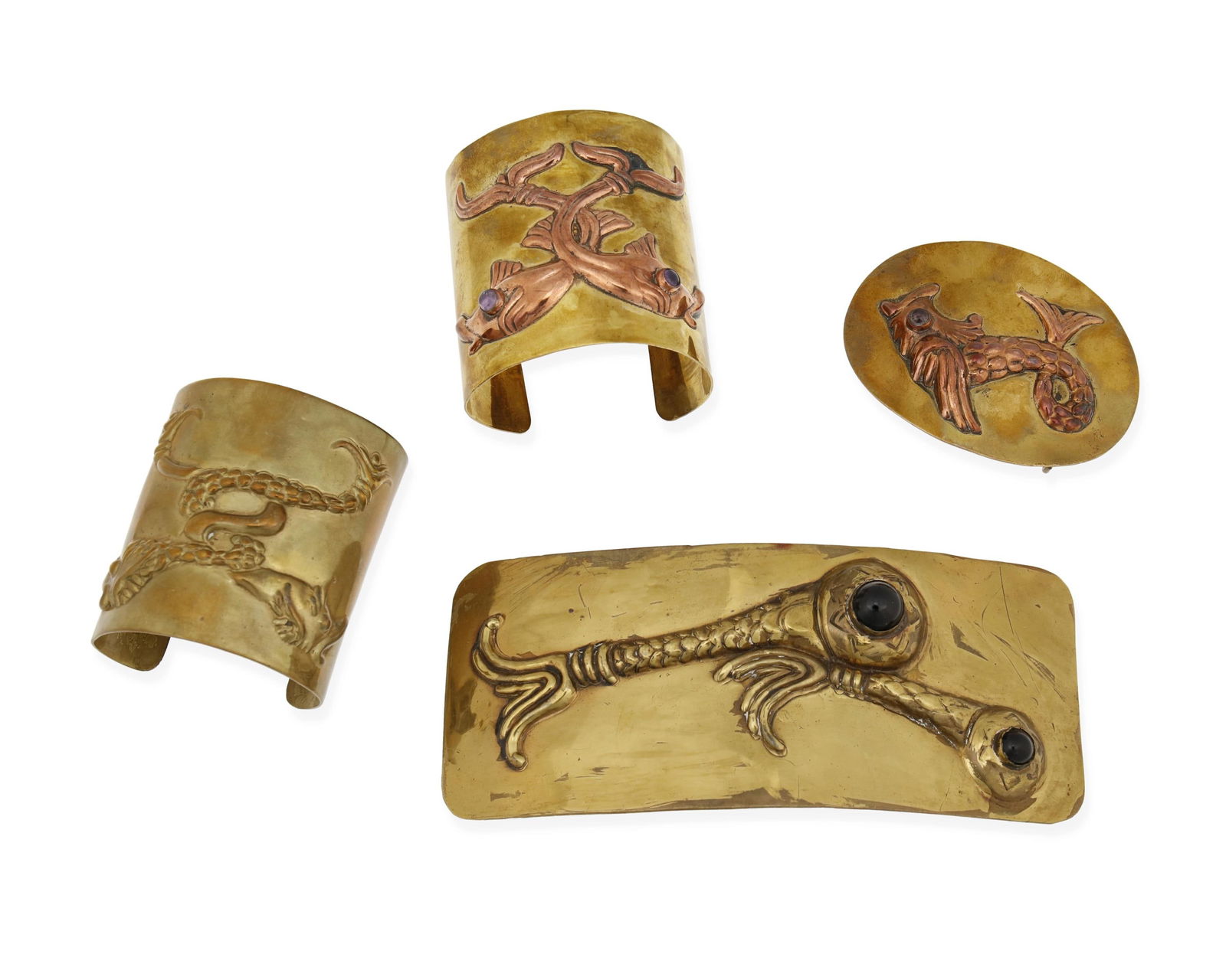 A group of Hubert Harmon mixed metal "Cyclops" or "Sea Serpent" jewelry: A group of Hubert Harmon mixed metal "Cyclops" or "Sea Serpent" jewelryHubert Harmon (1913-2004)Circa 1942-1948; Mexico City, MexicoThree works variously stamped for Hubert Harmon;