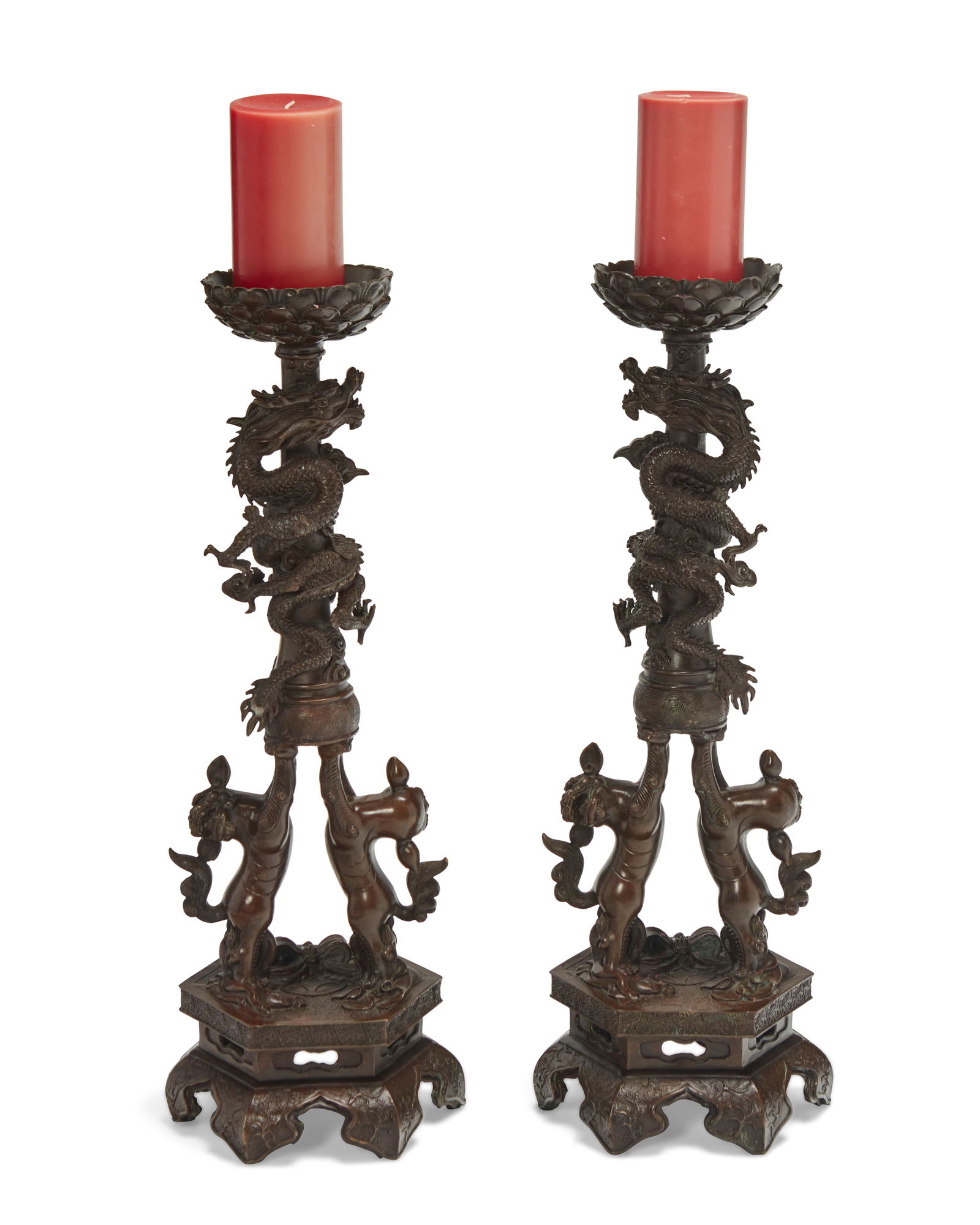 A pair of East Asian metal candlesticks (1 of 5)