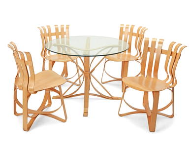 Frank Gehry (b.1929), Four "Hat Trick" dining chairs and a "Faceoff" dining table for Knoll Studio,: Frank Gehry (b.1929)Four "Hat Trick" dining chairs and a "Faceoff" dining table for Knoll Studio, circa 2000Each designed 1990Each with burn marked signature and Knoll logo; chairs