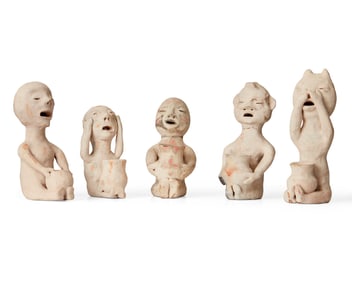 A group of Tesuque Pueblo pottery rain gods