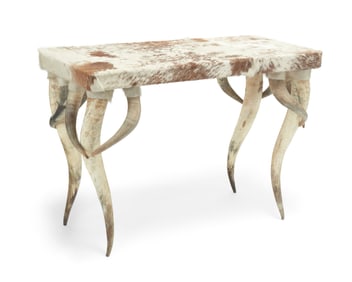 A cattle horn and hide console table
