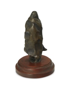 A Native American miniature bronze figure