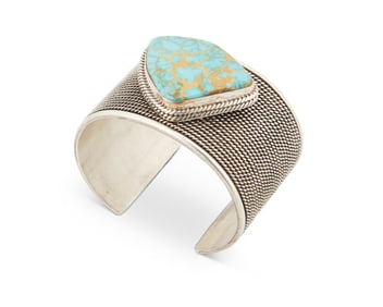 A Tom Taylor Navajo sterling silver and turquoise cuff bracelet