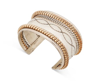 A Franklin & Verna Tahe Navajo silver and gold-filled cuff bracelet