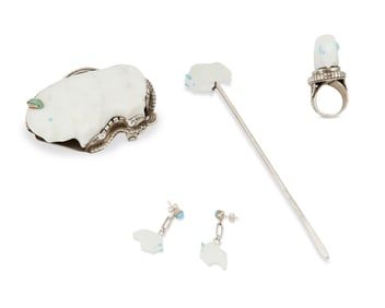 A set of Southwest carved stone buffalo fetish jewelry