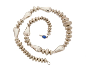 An Orville Tsinnie Navajo sterling silver necklace