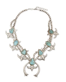 A Navajo silver and turquoise squash blossom necklace