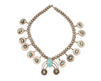 A Southwest coin silver squash blossom necklace