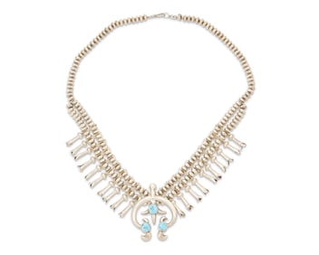 A Southwest silver and turquoise squash blossom necklace