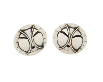A pair of Denise Wallace sterling silver mask earrings