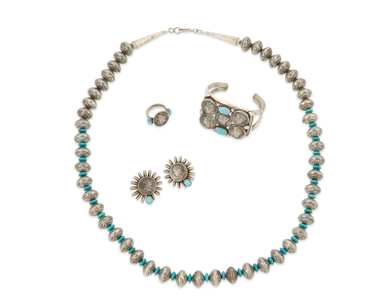 A set of Art Tafoya coin silver and turquoise jewelry: A set of Art Tafoya coin silver and turquoise jewelryArt Tafoya (b. 20th century; Yaqui)Mid/late 20th centuryCuff stamped: AT [cipher] / Sterling; Necklace terminal stamped: Coin Silver / ©Four works