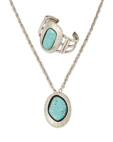 Two Navajo sterling silver jewelry items