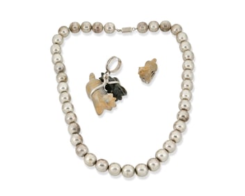 A group of Zuni Pueblo stone horse fetish jewelry