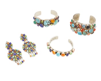 A group of Navajo sterling silver and cluster set jewelry