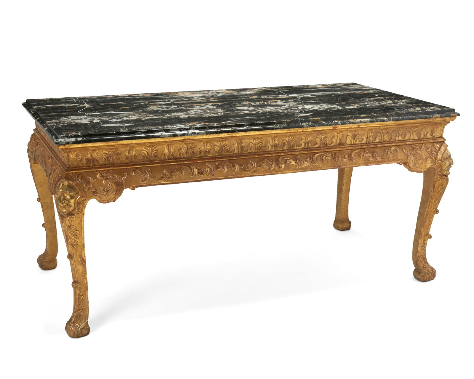 George III-style giltwood and marble console table: George III-style giltwood and marble console table20th centuryThe giltwood table in the manner of William Kent, featuring carved scrolled foliate designs and an architectural cornice, raised on four c