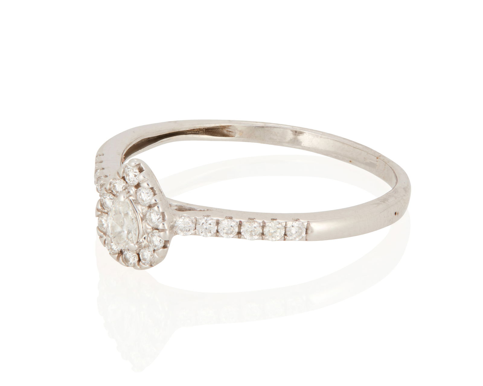 A Diamond Ring: A Diamond RingCentering a pear-shaped diamond weighing approximately .05 carat within a frame of 22 round brilliant-cut diamonds weighing approximately .20 carat set in 10K white gold1.9 grams grossRi