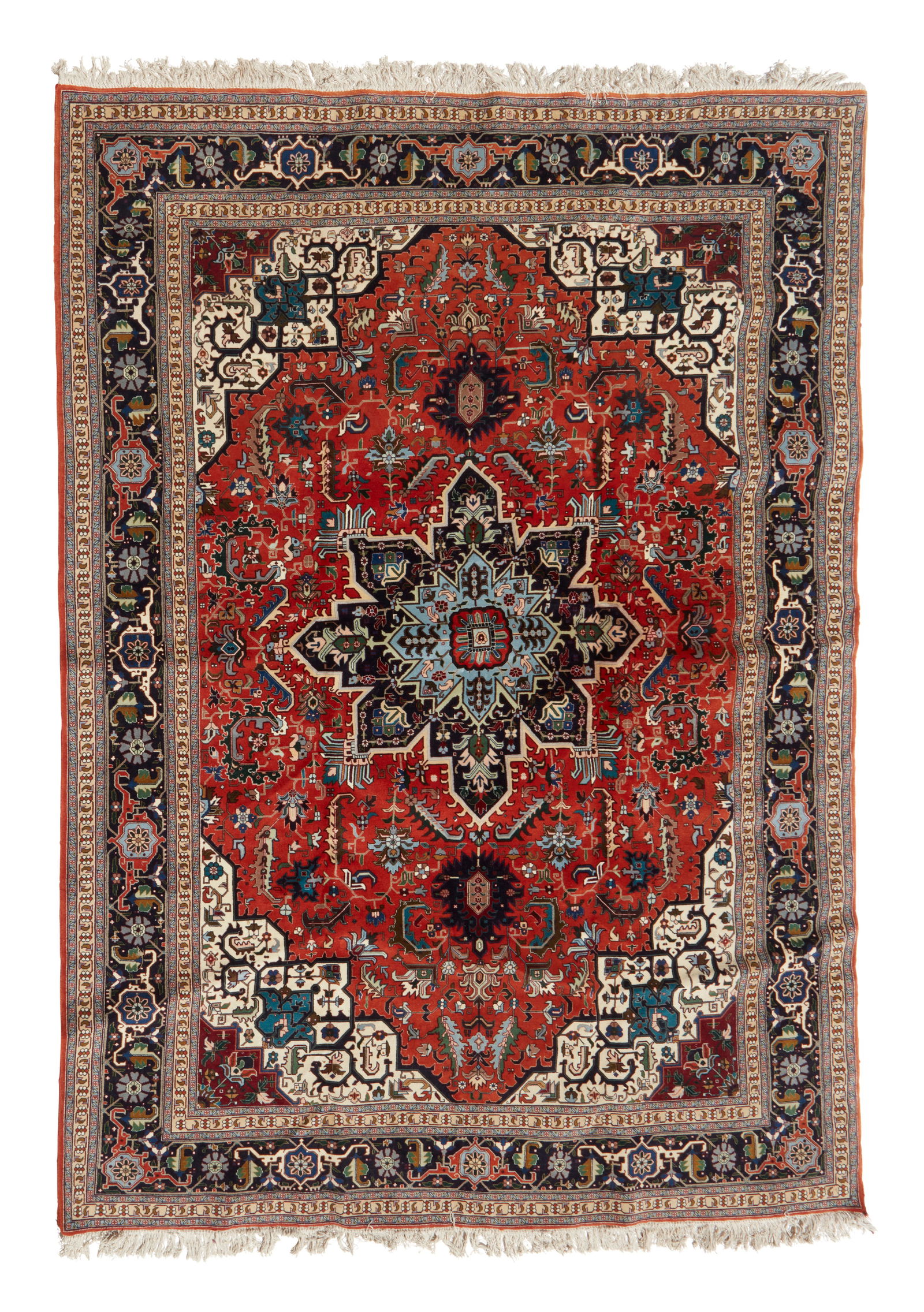 A Tabriz area rug: A Tabriz area rugLate 20th centuryThe wool-on-cotton rug featuring a blue border and medallion with geometric motifs on a red ground9' 6" L x 6' 6" W