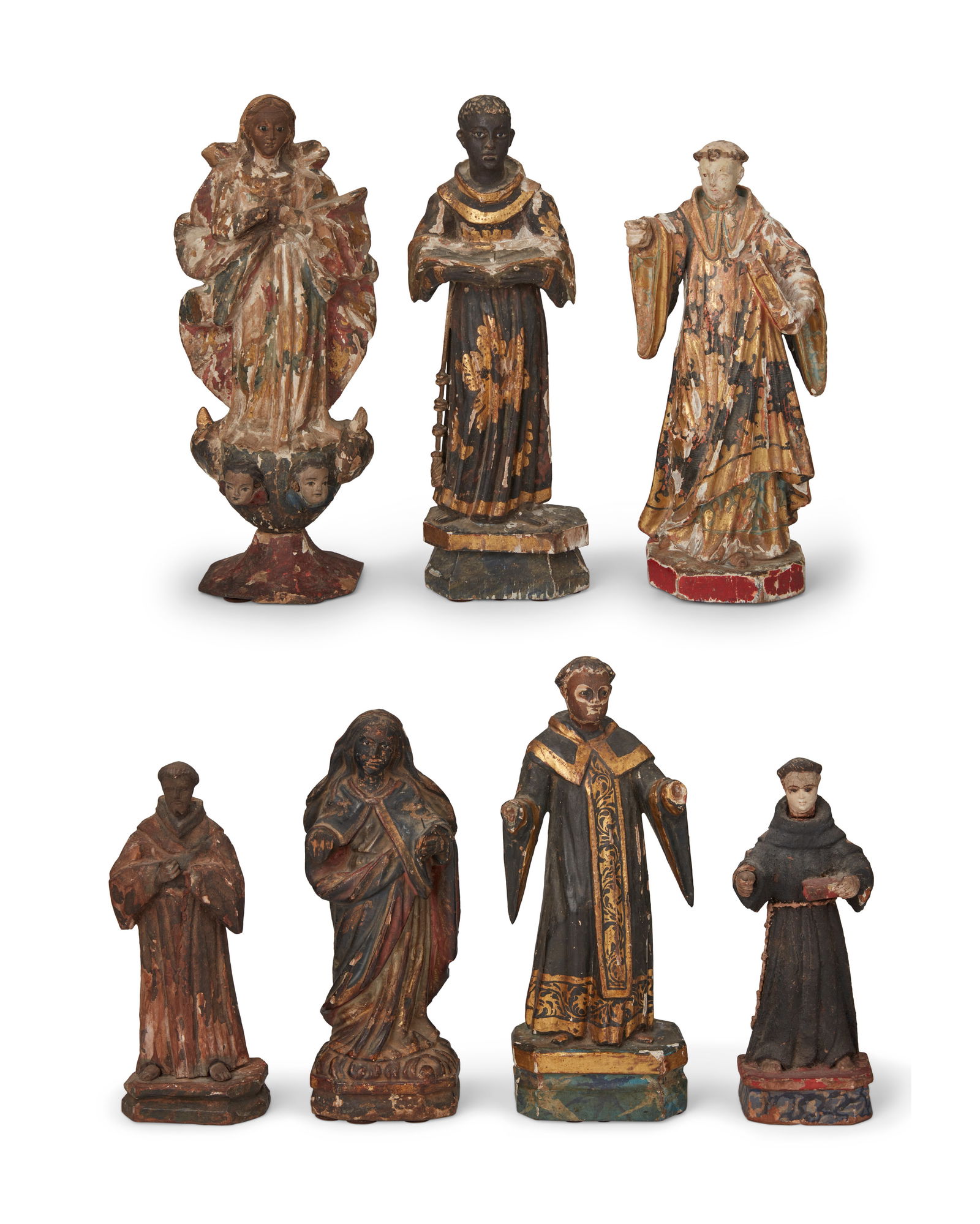 A group of Latin American santos bultos figures (1 of 9)