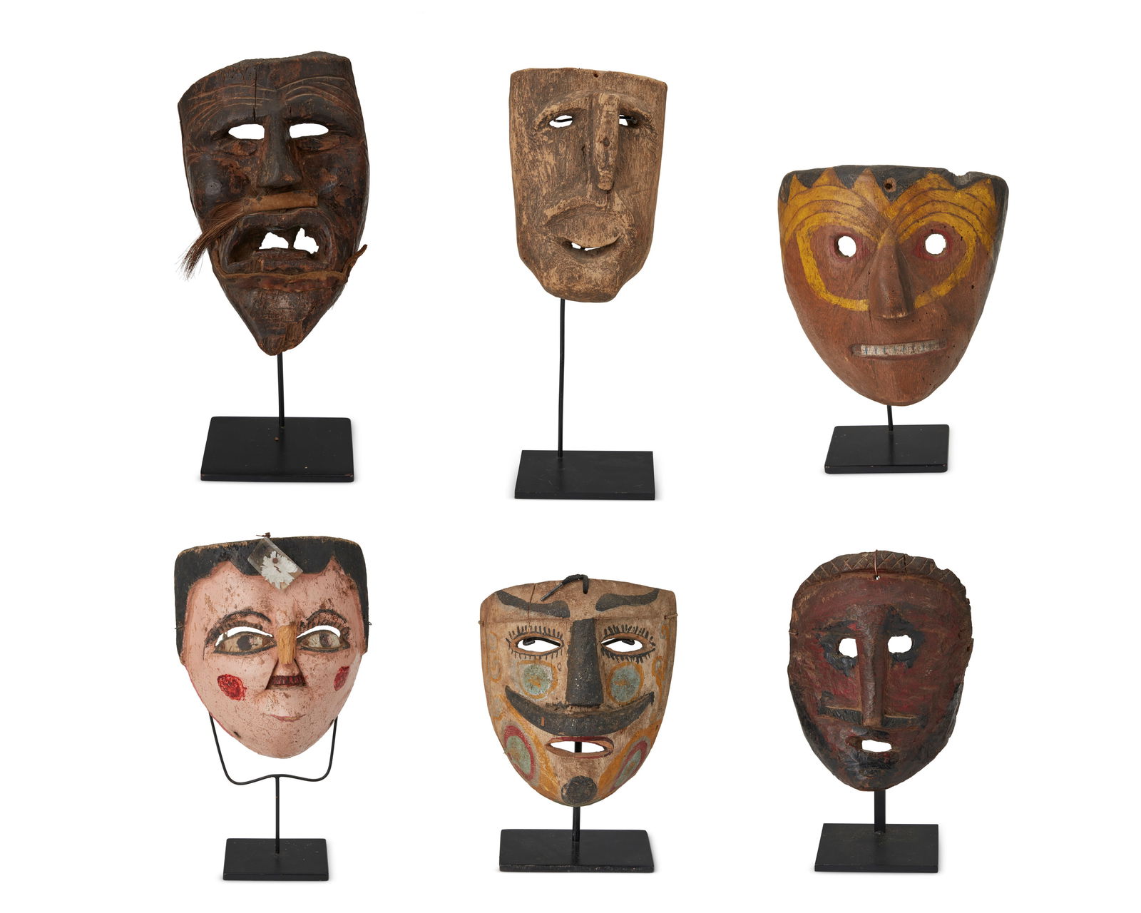 A group of Mexican carved wood masks (1 of 20)