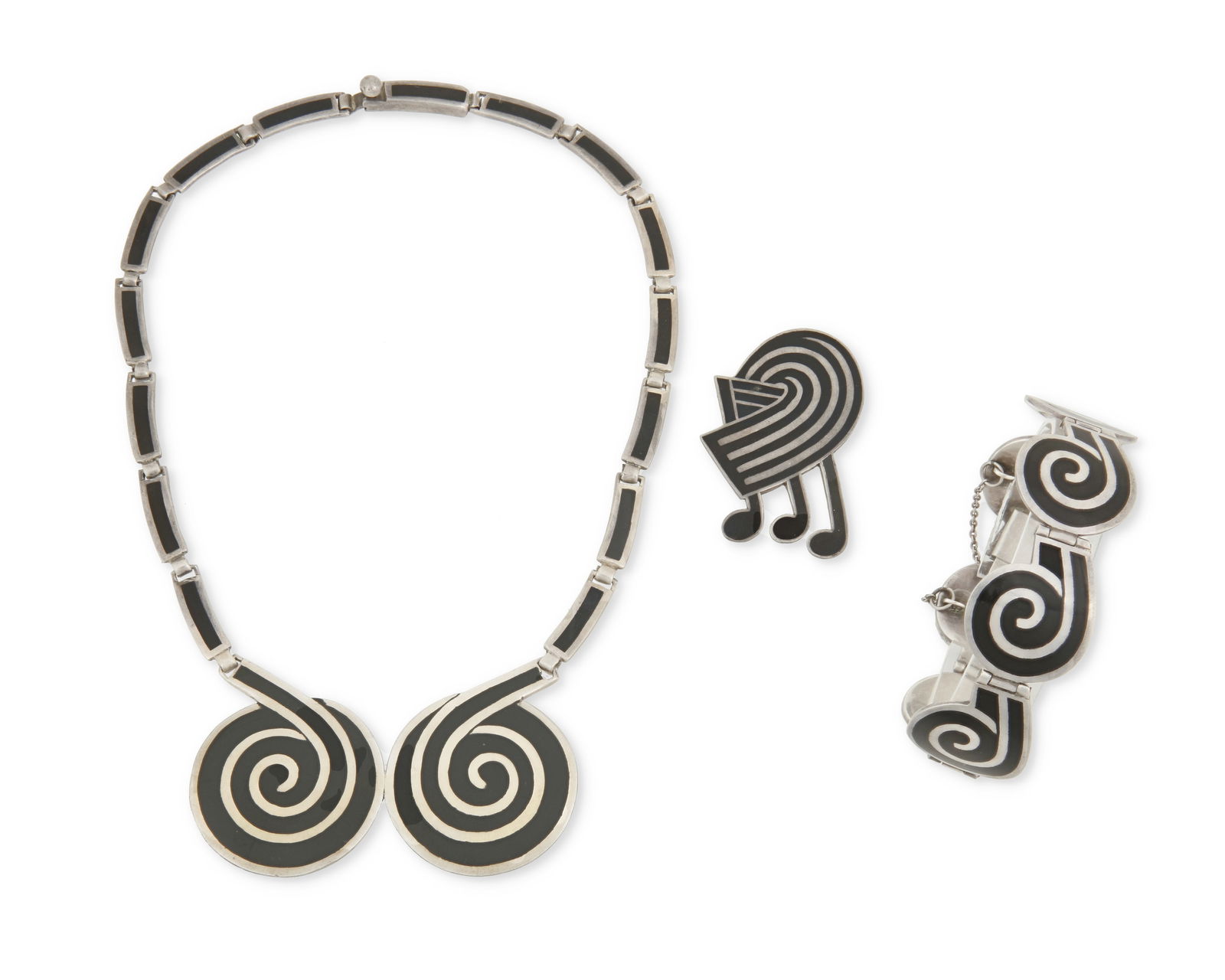 A group of Margot de Taxco Mexican silver and enamel jewelry: A group of Margot de Taxco Mexican silver and enamel jewelryMargot Van Voorhies (1896-1985)Circa 1955-1978; Taxco, MexicoEach stamped: Margot de Taxco / Sterling / Made in Mexico / [Eagle 16] / [Desig