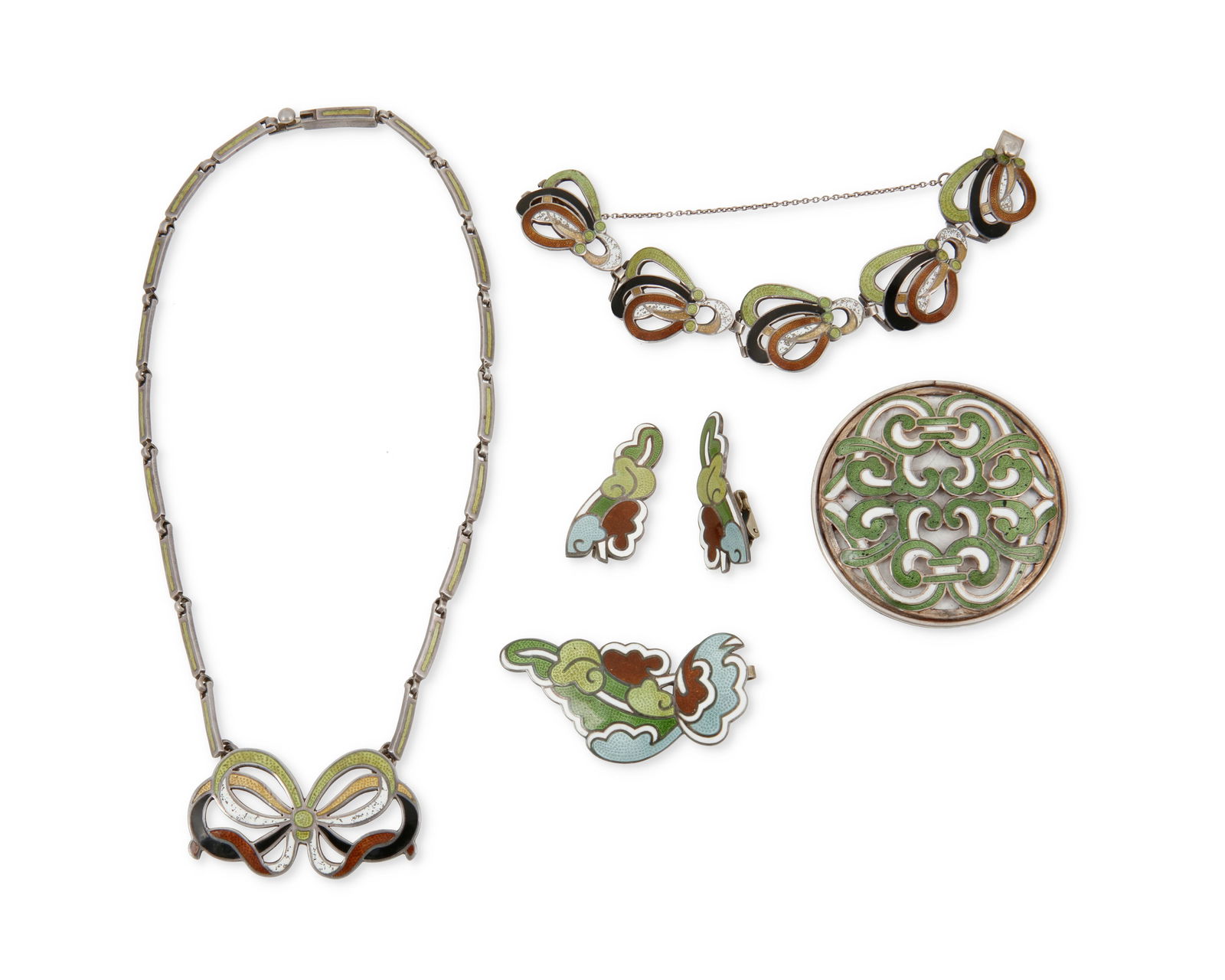 A group of Margot de Taxco Mexican silver and enamel jewelry: A group of Margot de Taxco Mexican silver and enamel jewelryMargot Van Voorhies (1896-1985)Circa 1955-1978; Taxco, MexicoEach stamped: Margot de Taxco / Sterling / Made in Mexico / [Eagle 16] / [Desig