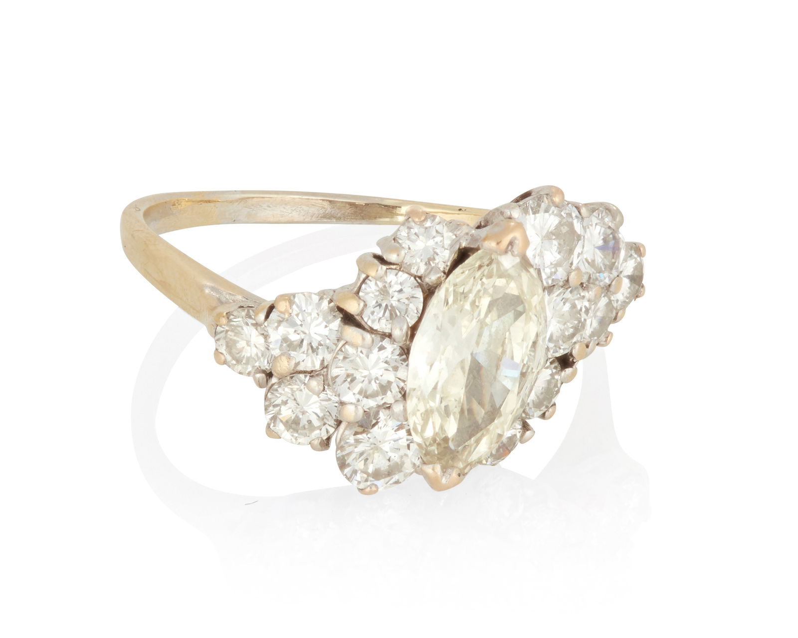 A Diamond Ring: A Diamond RingCentering a marquise-shaped diamond weighing 1.09 carats accented by 16 round brilliant-cut diamonds weighing approximately 1.50 carats, set in yellow and white gold5.24 grams grossRing